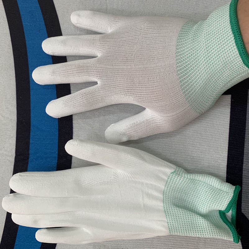 Giới thiệu về găng tay PU phủ bàn, màu trắng, cổ xanh